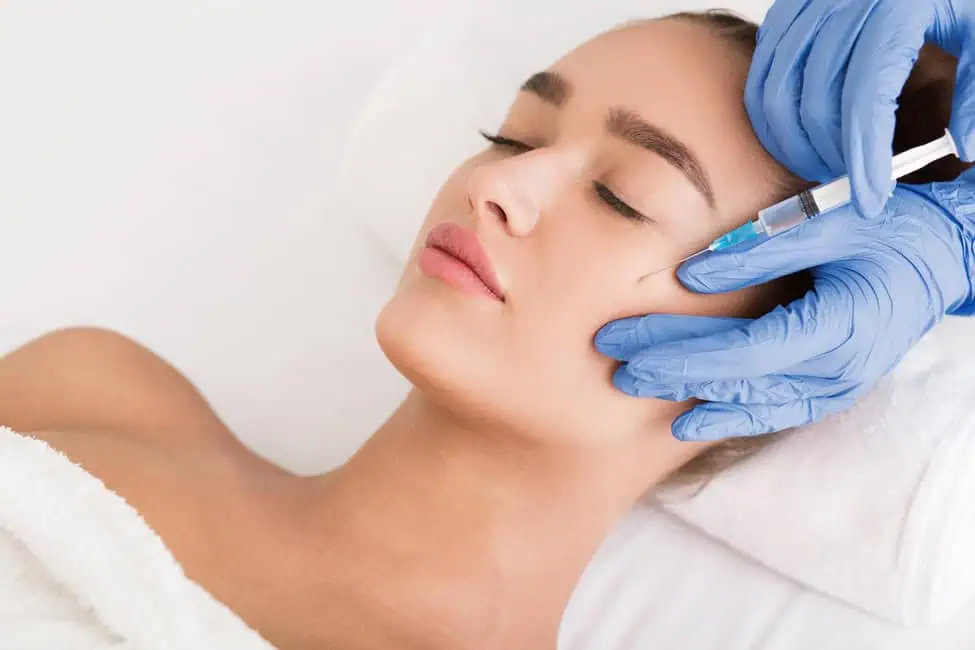 Woman receiving a Botox injection in Horseshoe Bay, TX